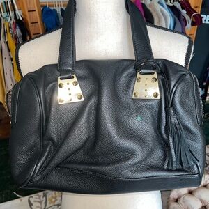 Black leather carrying bag